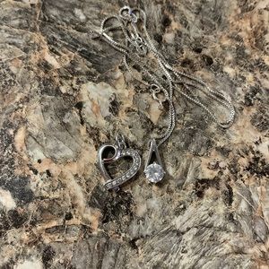 this is a dimand necklace with heart jewel added in